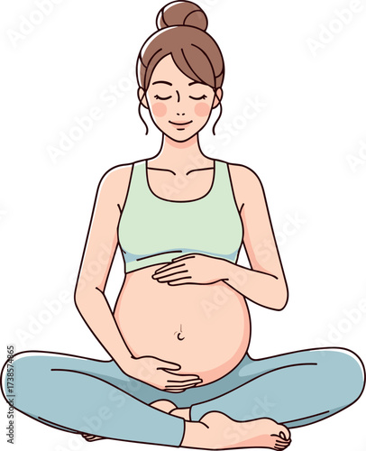 Pregnant woman sitting cross legged with hands on her belly
