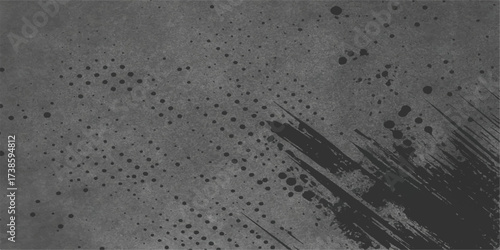 Black and white vintage texture of rain drops on a dirty window against a rough concrete wall