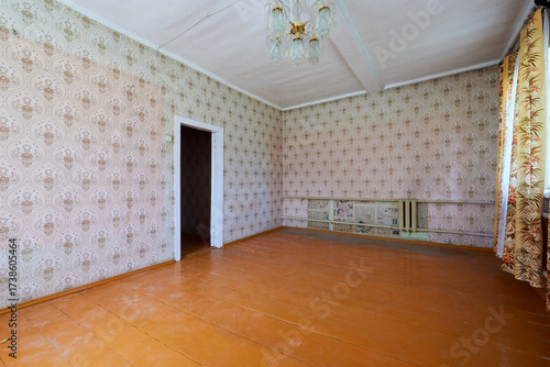 empty room in old soviet house with wooden floor