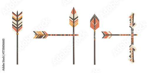 Set of four hand drawn boho style arrows with ethnic tribal geometric patterns in warm earthy colors for decorative design elements