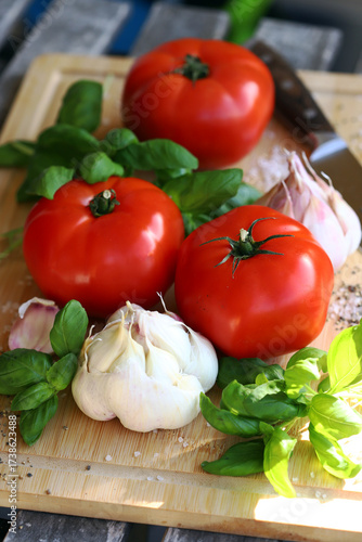 large tomatoes with basil and garlic