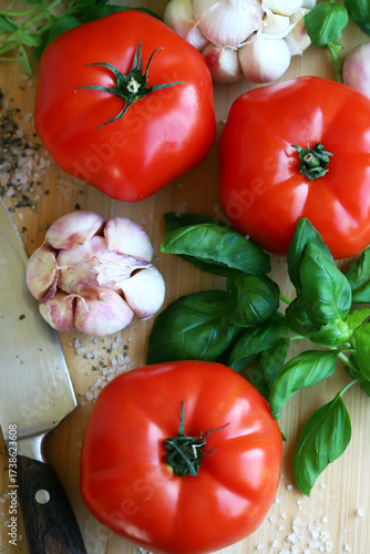 large tomatoes with basil and garlic