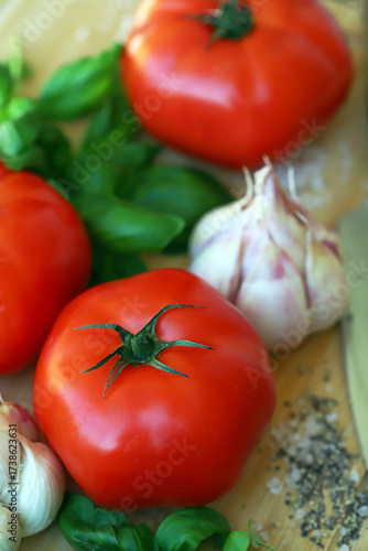 large tomatoes with basil and garlic