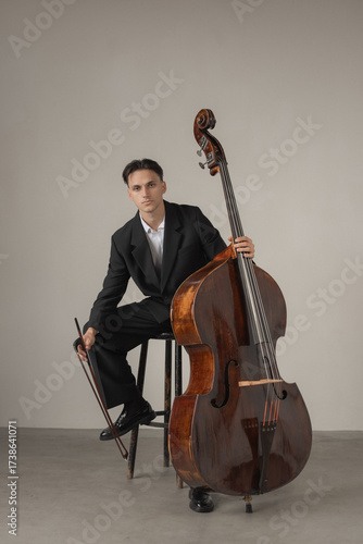 young man playing contrabass