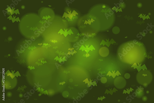 Abstract green background with flying bat silhouettes and glowing bokeh effects, perfect for Halloween designs and spooky themes
