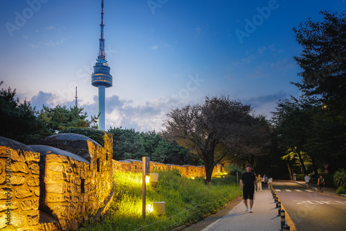 Night view of Namsan N Seoul Tower and fortress walls in Seoul, South Korea
