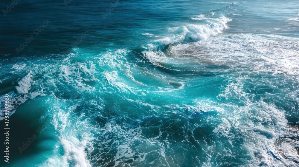 Fototapeta premium Natural patterns in science are beautifully displayed in swirling turquoise ocean waves with dynamic movement and foamy texture