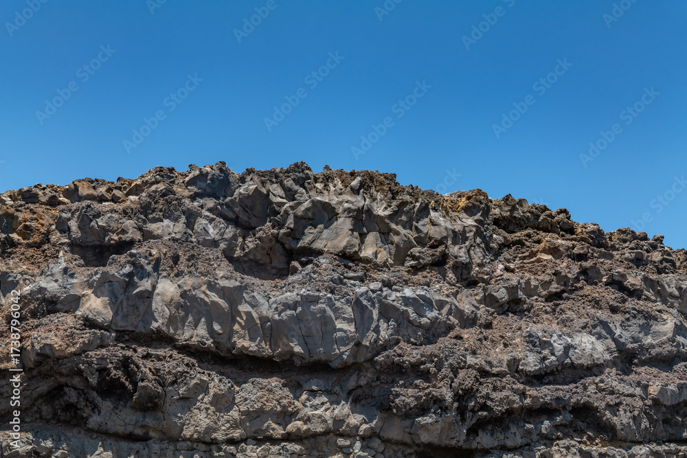 Obraz premium Wai‘Ōpae Gulch, Hawaii Route 31 / Pi'ilani Highway, island of Maui, Hawaii. Haleakalā / East Maui Volcano, is a shield volcano. Basalt, Lava flows, Hana Volcanics.