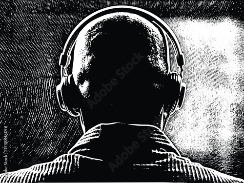 Intense monochrome portrait of a bald man absorbed in music, wearing headphones, perfect for conveying focus, concentration and artistic expression