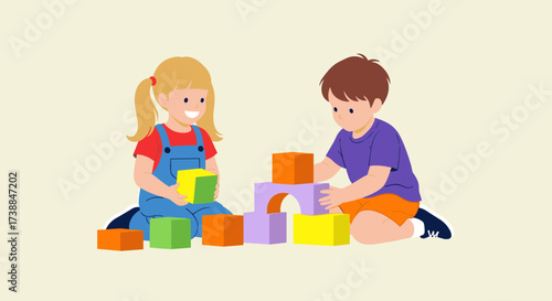 Two young children are playing together with colorful building blocks on the floor.