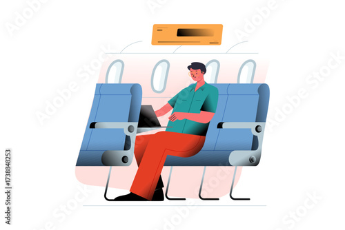 Man working on laptop in airplane seat
