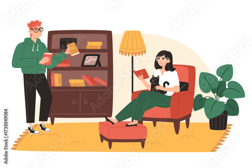 Man placing book on shelf woman reading with cat