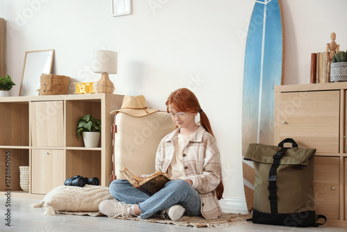 Cute teenage happy redhead ...