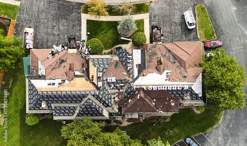 Aerial View of Townhouses Roof Under Construction and Repair