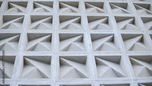 Modern Architectural Concrete Wall with Geometric Triangular Pattern