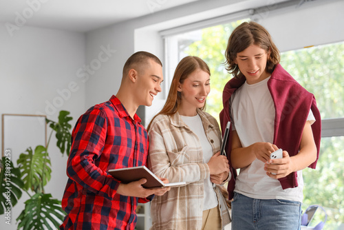 Group of students using mob...