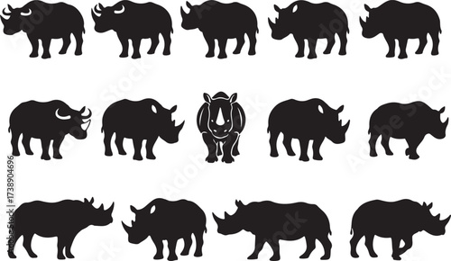 Rhino Silhouette Pattern: A striking visual design composed of a diverse array of rhino silhouettes, illustrating wildlife and animal design.