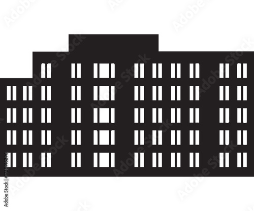 Black silhouette of a large building with many windows