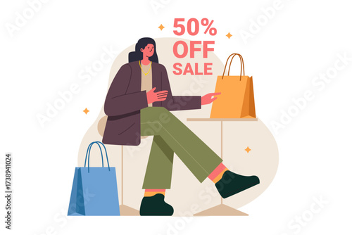 Woman with shopping bags and 50 off sale sign