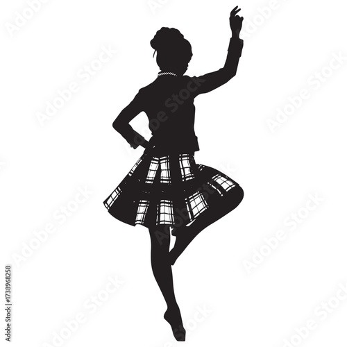 Silhouette of a highland dancer in a tartan kilt performing a graceful step with one arm raised