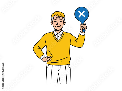 Senior man voting no or vetoing a decision with paddle