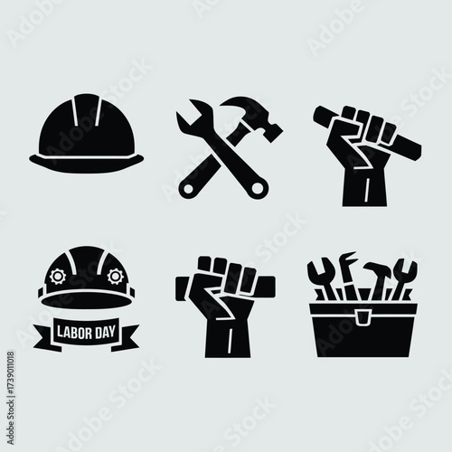 Labor day vector silhouettes set featuring hard hats wrenches fists and toolbox for industrial designs silhouette White background