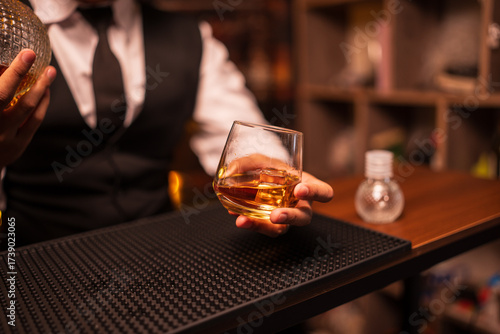 Businessmen in suits drinking Celebrate whiskey	