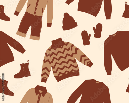 Cozy winter clothing seamless pattern with hats scarves and sweaters