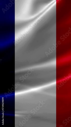 French flag waving majestically, a symbol of liberty, equality, fraternity and national pride