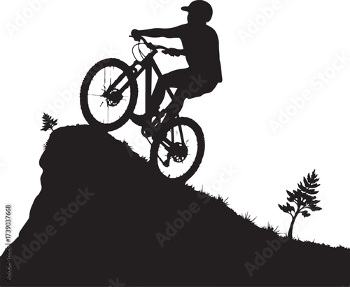 Black silhouette of mountain biker on cliff edge cyclist