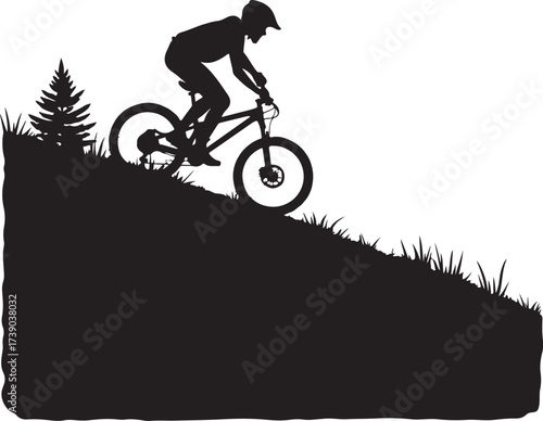 Black silhouette of mountain biker on grassy slope