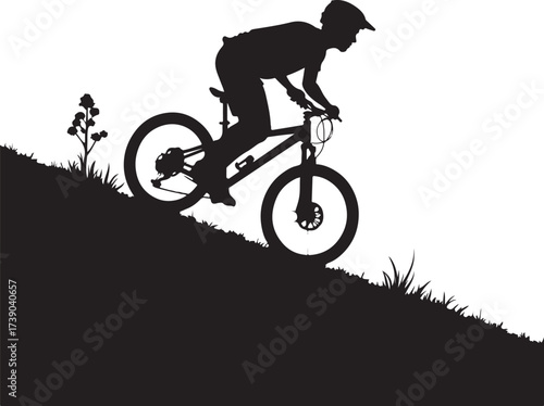 Black silhouette of person riding mountain bike downhill