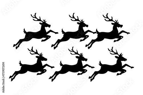 Silhouette of six reindeer flying