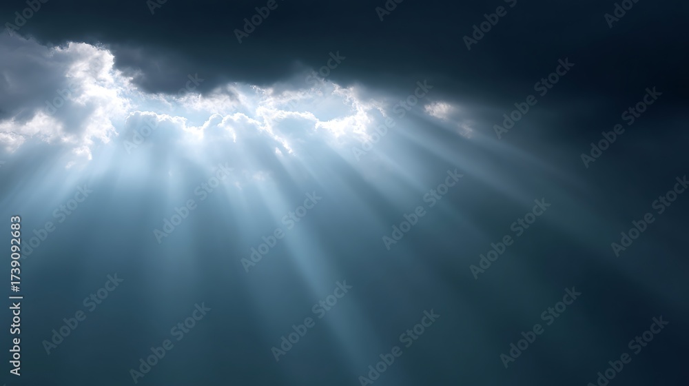 Fototapeta premium Dark storm clouds with dramatic sunlight rays breaking through