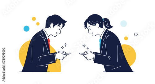 Business people exchanging name cards in a respectful Japanese greeting.