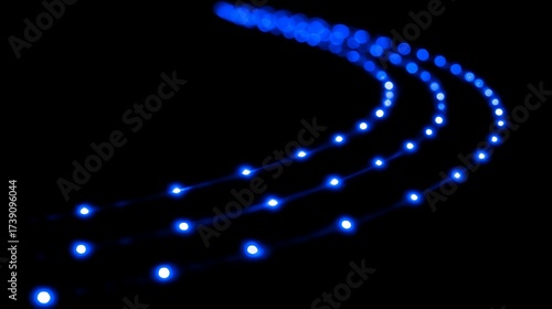 Blue light trails on a black background create a futuristic and dynamic effect ideal for