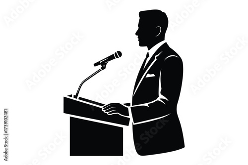 Black silhouette of a man speaking at a podium microphone