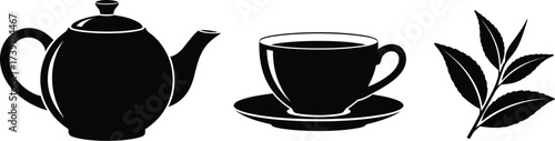 Elegant tea time set featuring a teapot, cup, and tea leaves, perfect for a relaxing and cozy atmosphere