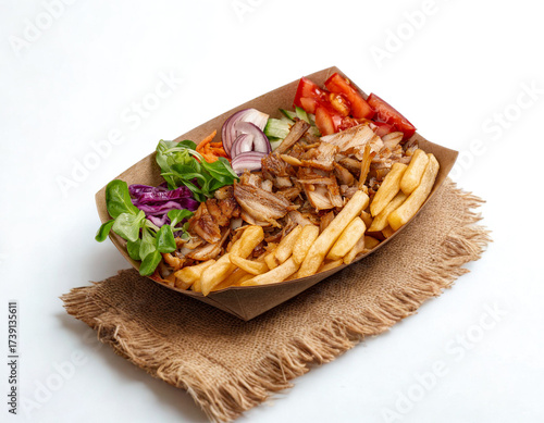 Delicious doner kebab box meal with fries and salad