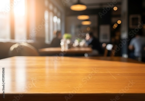 Wallpaper Mural Blurred interior of a cafe with tables and chairs, bathed in warm sunlight from the windows Torontodigital.ca
