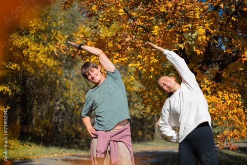 Cardio endurance exercises, use a fitness watch and an app. Runners athletes in fitness clothes.