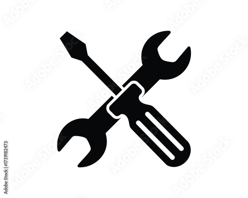 Simple black and white icon design of crossed screwdriver and wrench for tools and repair vector illustration silhouette vector illustration white background