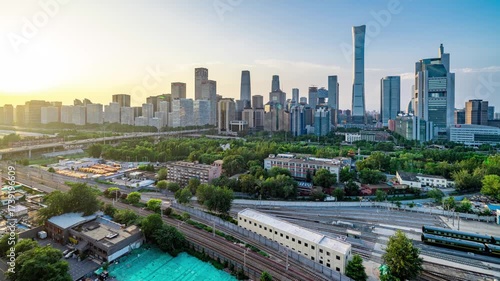 Beijing China World Trade Center skyline timelapse view at sunset with modern skyscrapers and railway station