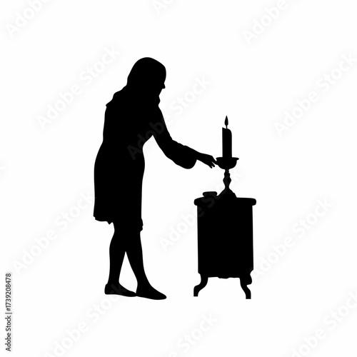 Silhouette of a woman lighting a candle during a power cut isolated on white background