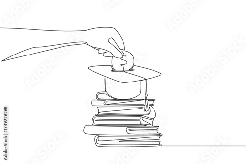 Single one line drawing hand holds coin inserting them into graduation cap and pile of thick books underneath. Serious about education. College Savings Day. Continuous line design graphic illustration