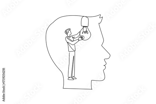 Single one line drawing a man installs a large bulb inside the silhouette of a large head. Stimulate brilliant ideas to come out. National Creativity Day. Continuous line design graphic illustration