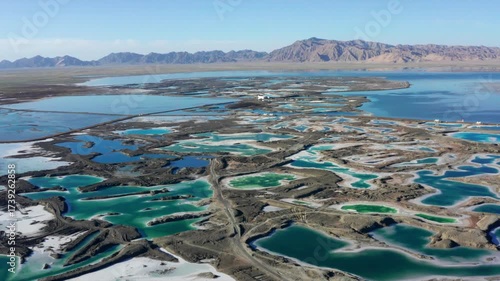 Aerial View of Dachaidan Emerald Salt Lakes with Desert Mountains, Qinghai Province China