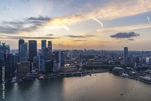 Wallpaper Mural Aerial view of skyscrapers piercing the skyline as the golden sun reflects on the bay, Singapore, Singapore. Torontodigital.ca