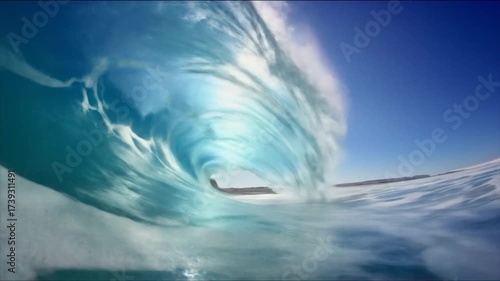 Ocean wave breaking in sunlight underwater view abstract nature concept