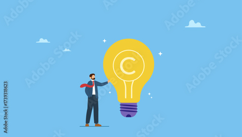 Businessman holding light bulb idea with copyright symbol. Copyright reserved, trademark intellectual property protection, original idea or innovation, legal or law protection registered.